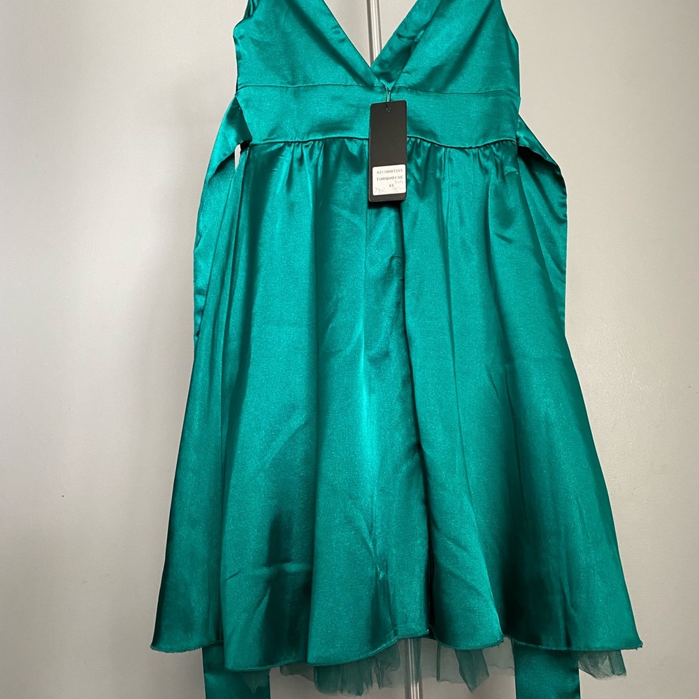 Brand new with tags. Purchased for a wedding and ended up wearing something else